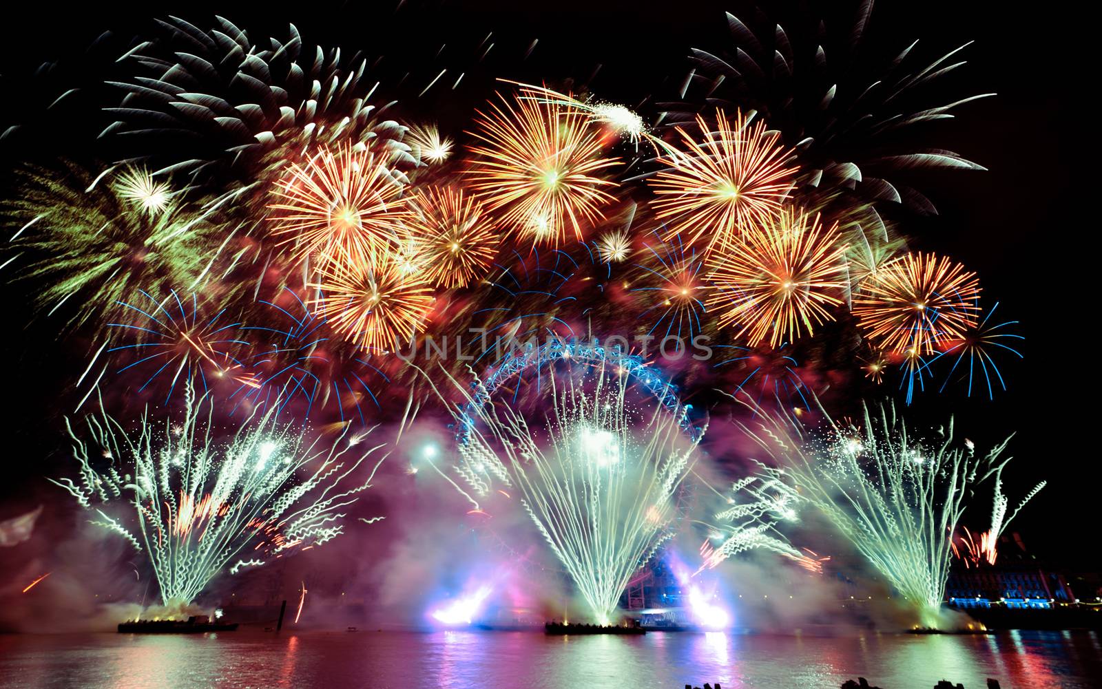 london eye light show and firework during new year eve