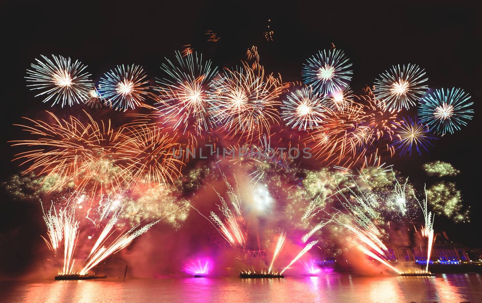 london eye light show and firework during new year eve