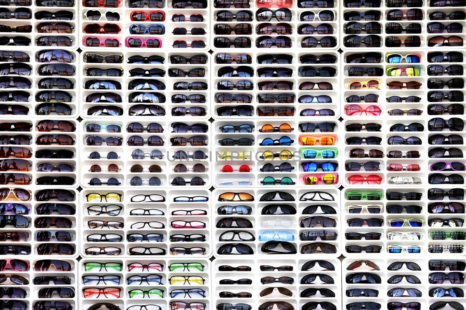 Many different sunglasses in shop