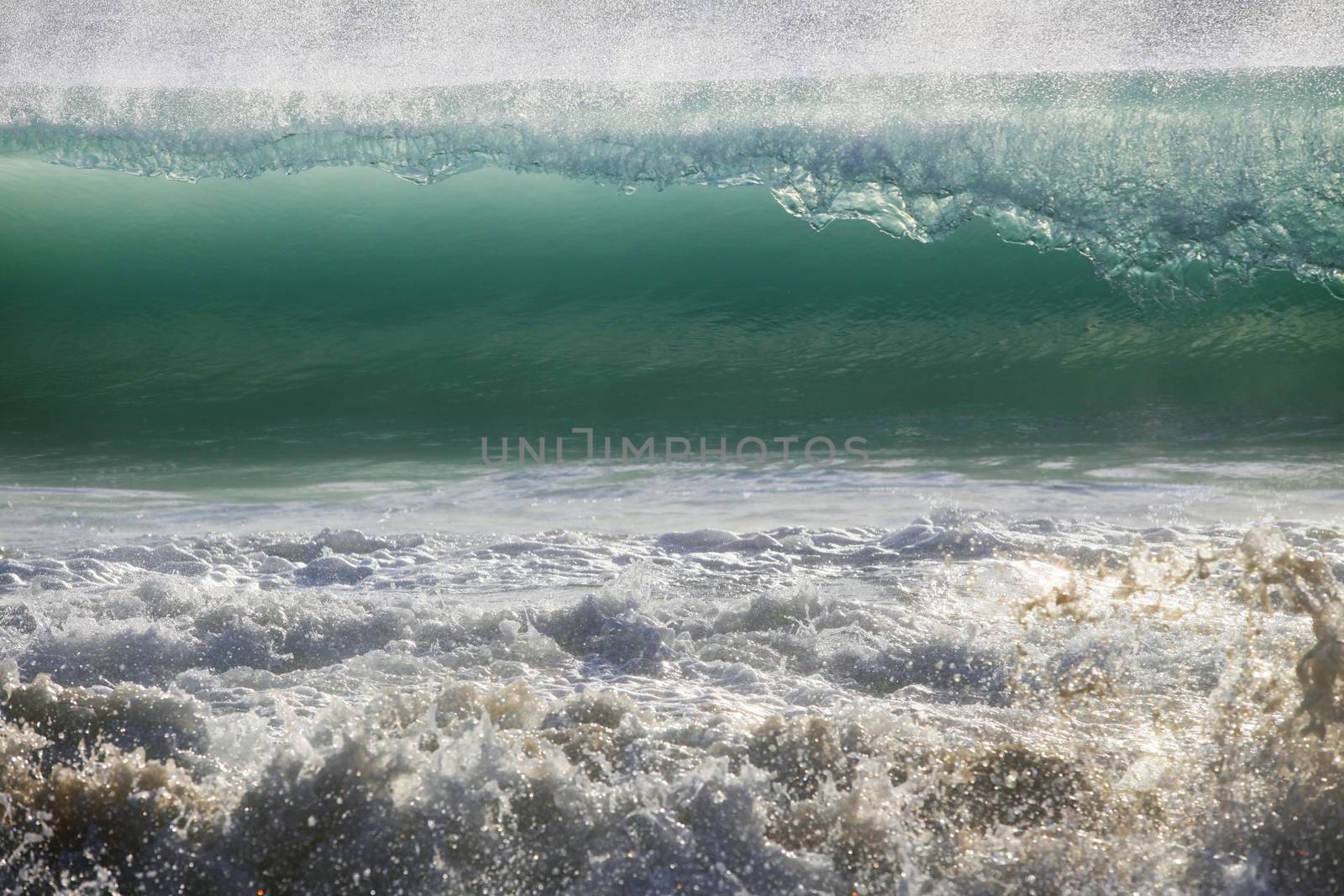 Big wave crashes on to the shore