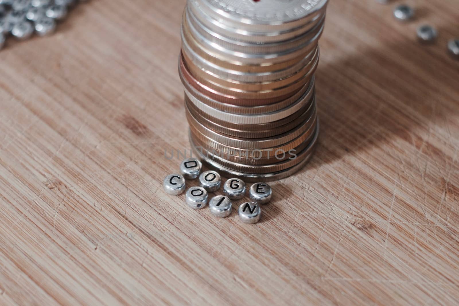 Digital currency doge coin inscription on the wooden board. Separate silver letters.