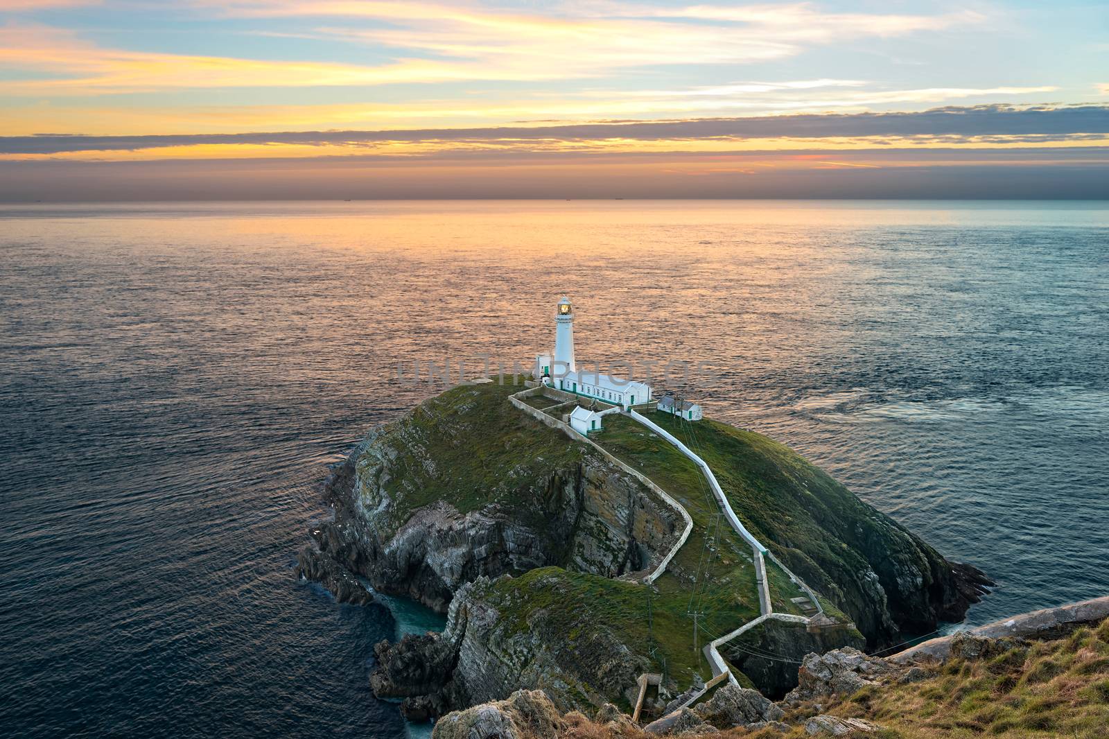 Holyhead, Wales, United Kingdom - September 17, 2016: South stack lighthouse on Holy Island at sunset