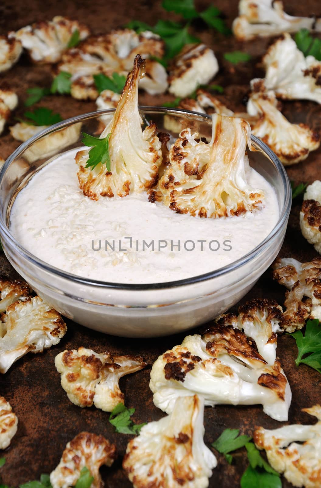 Roasted cauliflower with tahini sauce (sesame paste)
