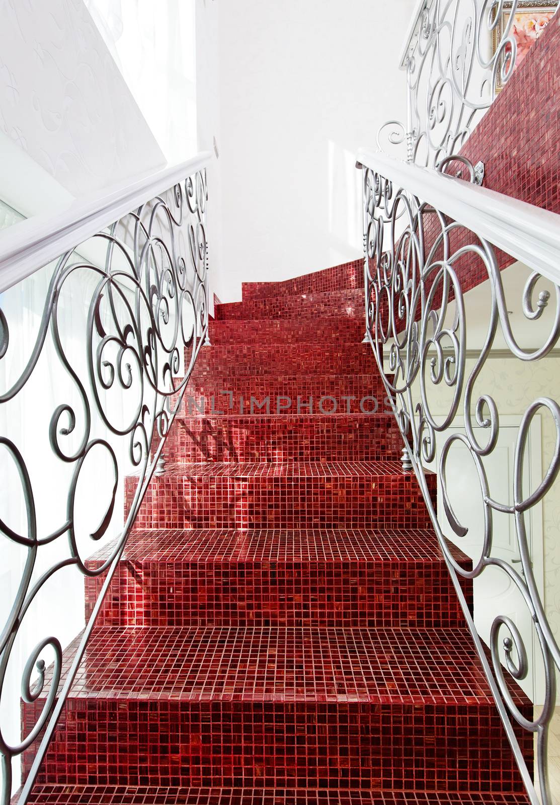 Classical mosaic stairs with beautiful handrail  by RawGroup