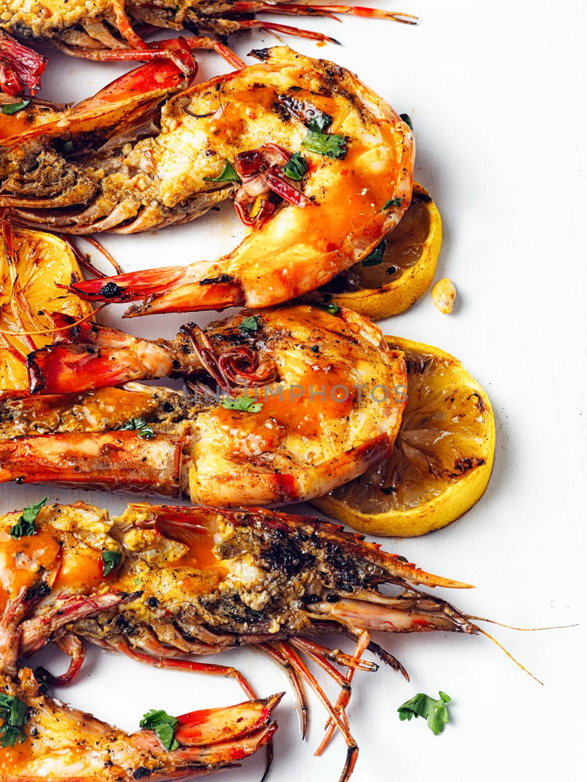 close up of rustic piri-piri grilled prawn