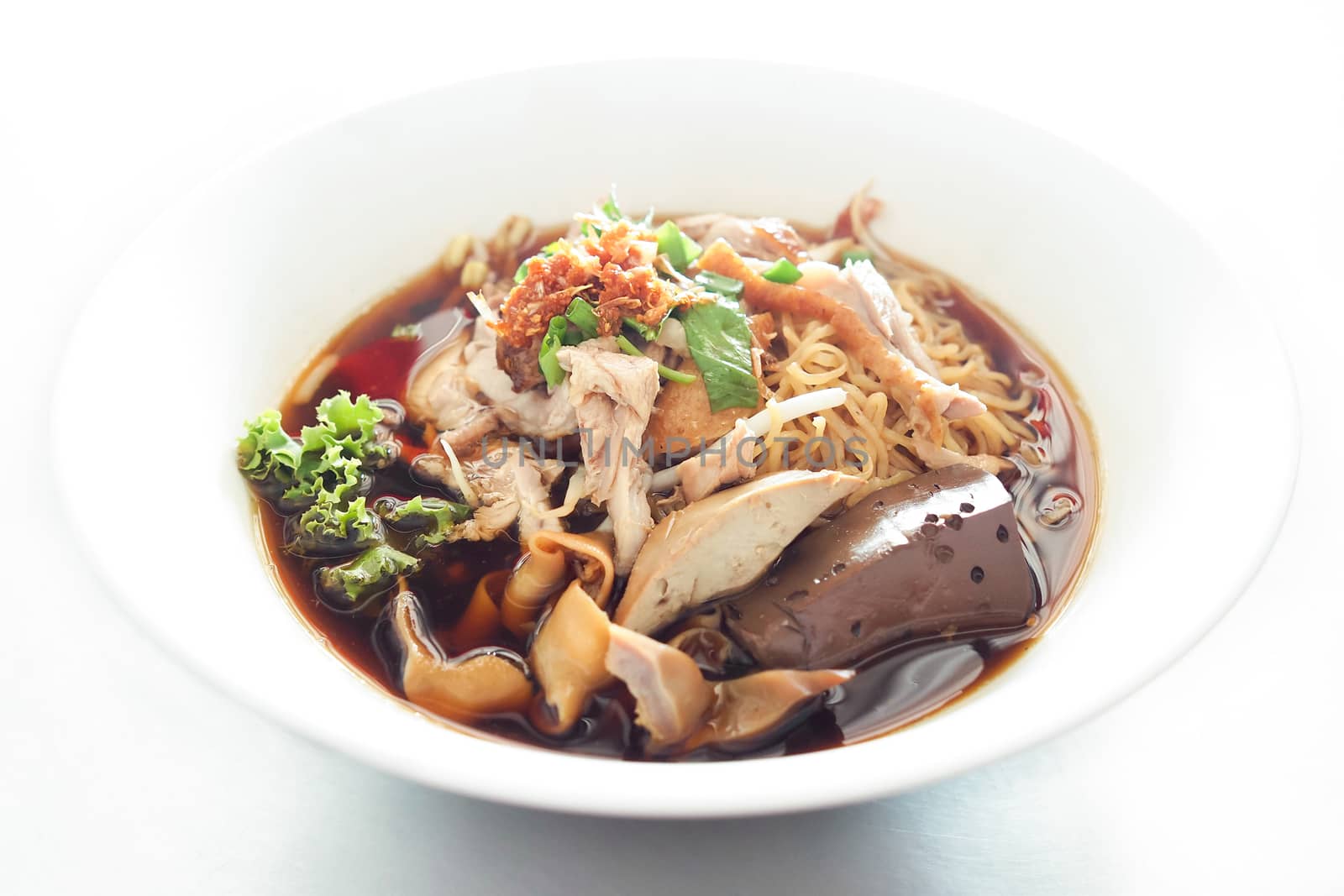 Noodle soup stewed duck put the blood and animal offal. Thailand food Chinese style.