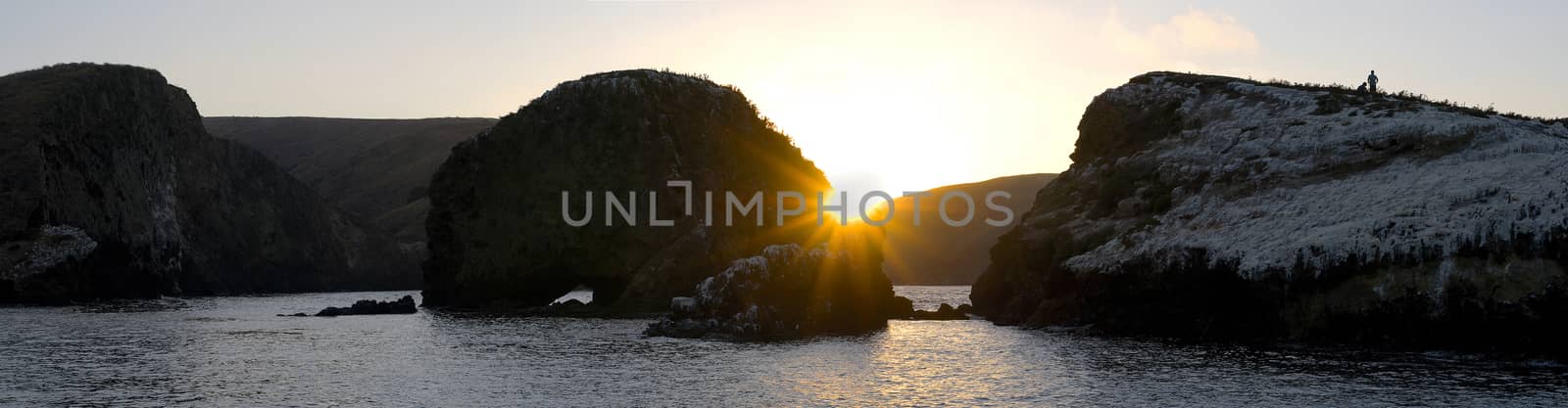 Sunset panorama at Santa Cruz Island as seen from a boat. Santa Cruz, Channel Islands.