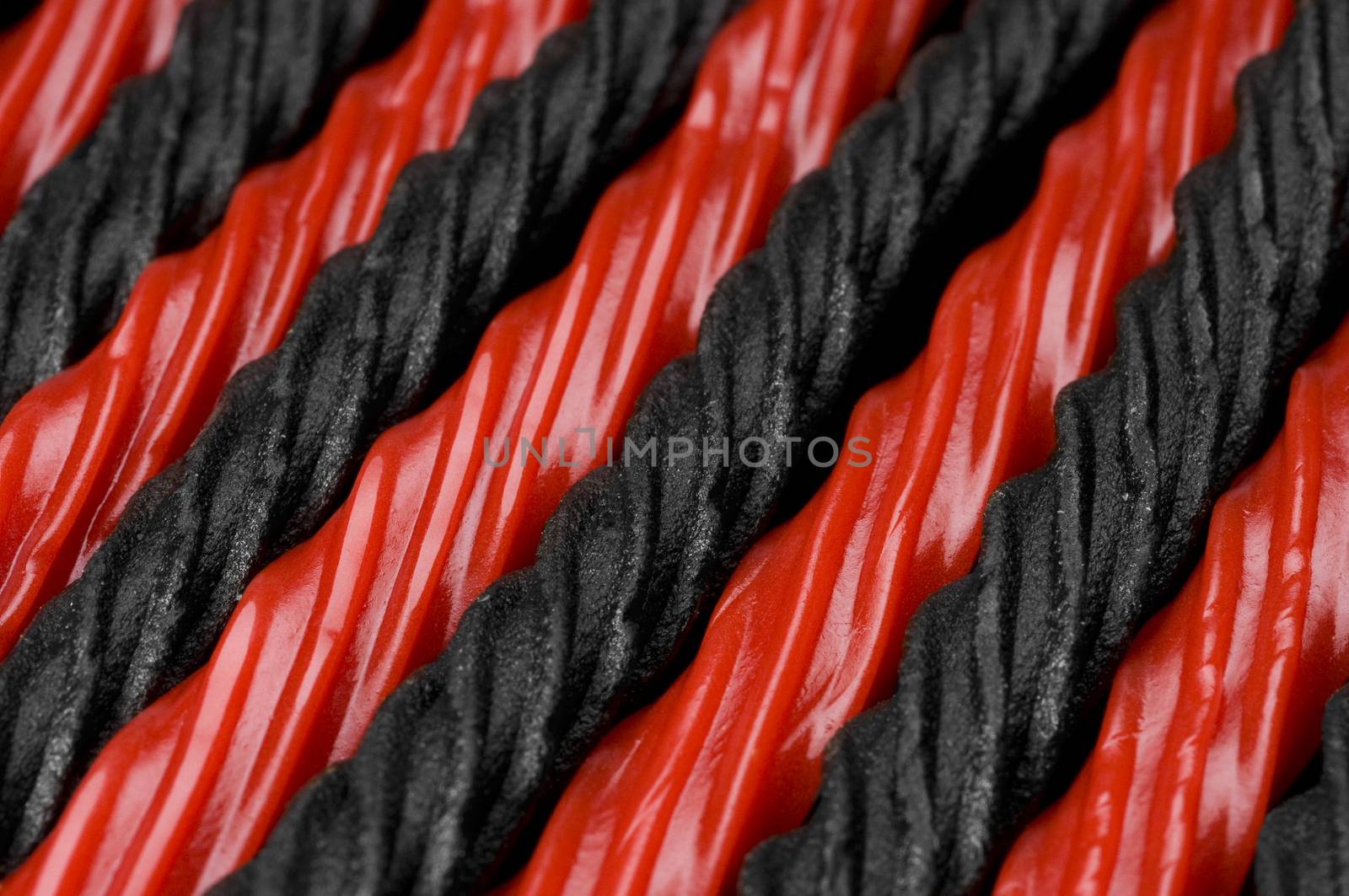 red and black licorice by Njean
