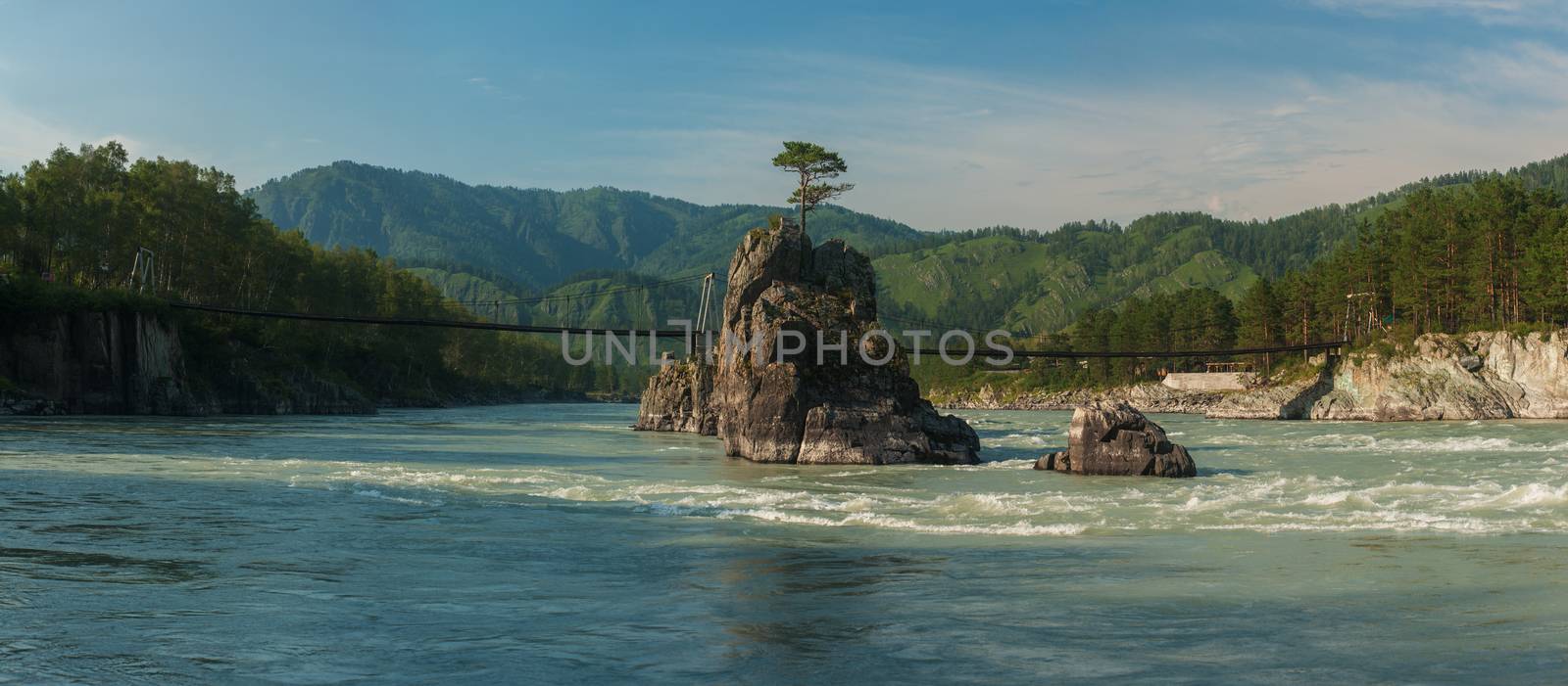 Fast mountain river Katun in Altay, Siberia, Russia. A popular tourist place called the Dragon's Teeth