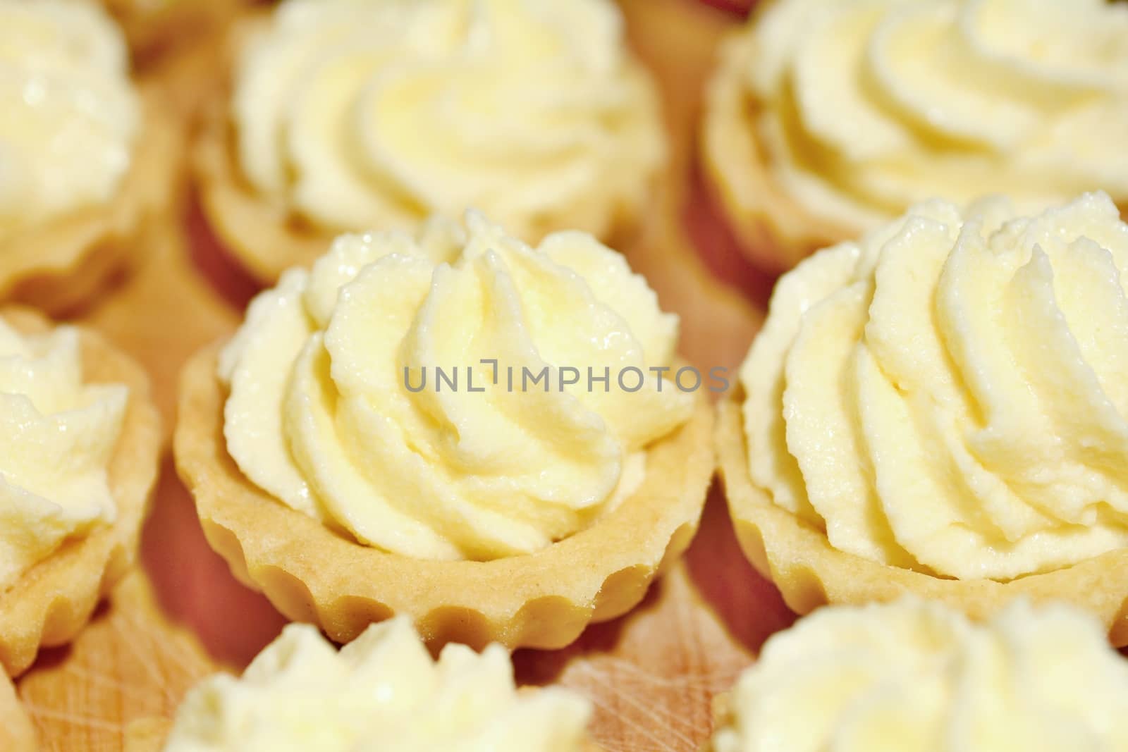 Closeup of cupcakes filled with vanilla cream.