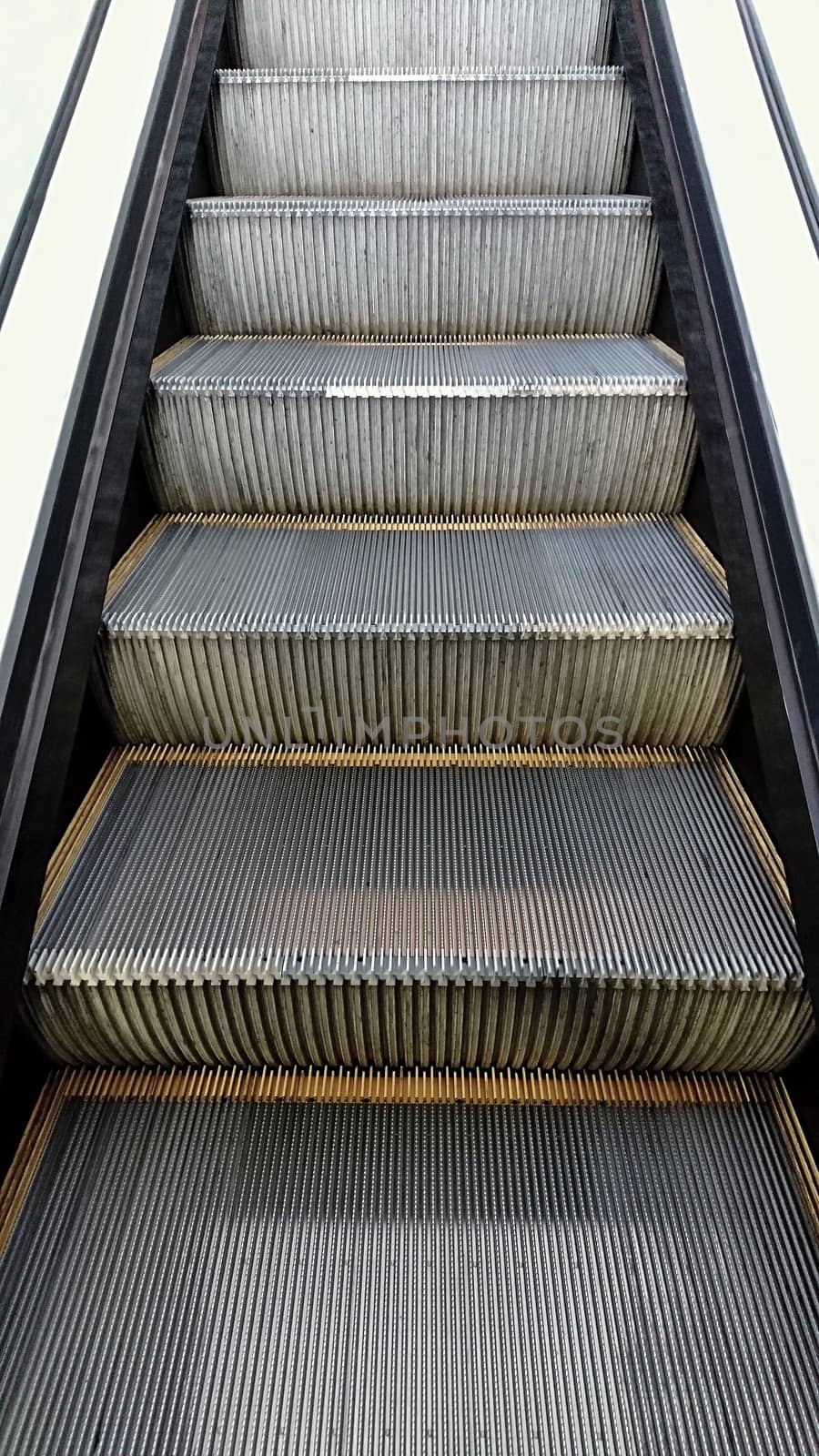 Close up of metal escalator steps.