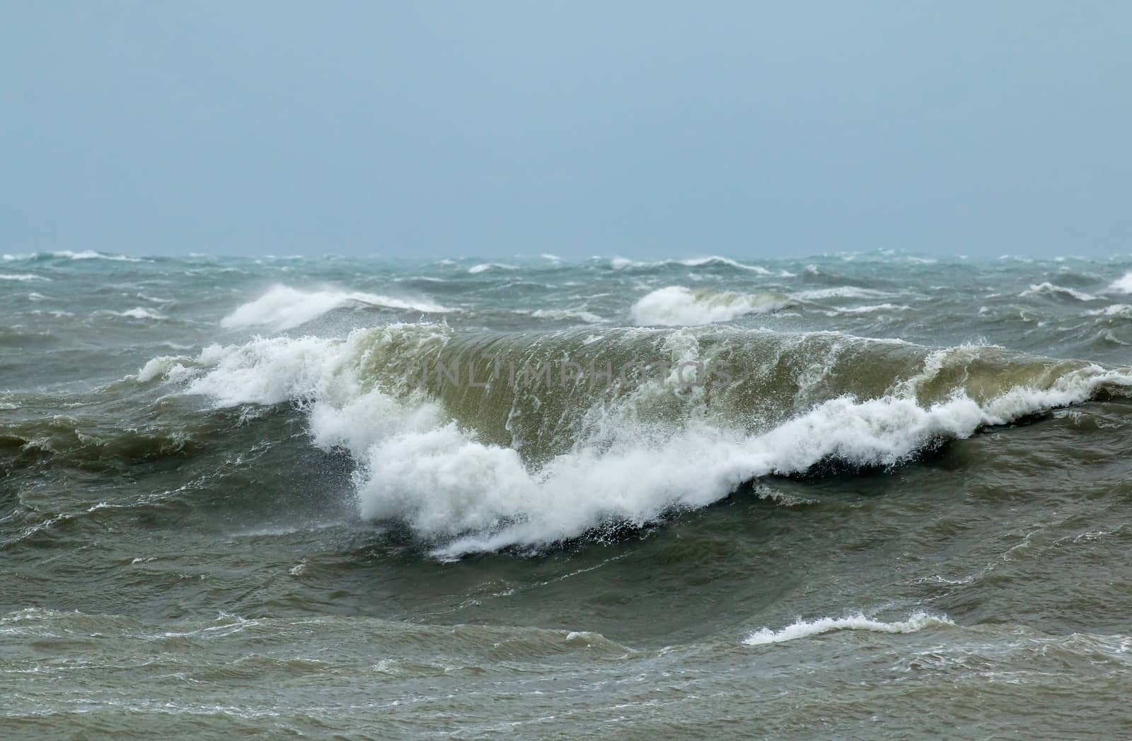 Rough sea with crashing waves in English Channel off Seaford in East Sussex