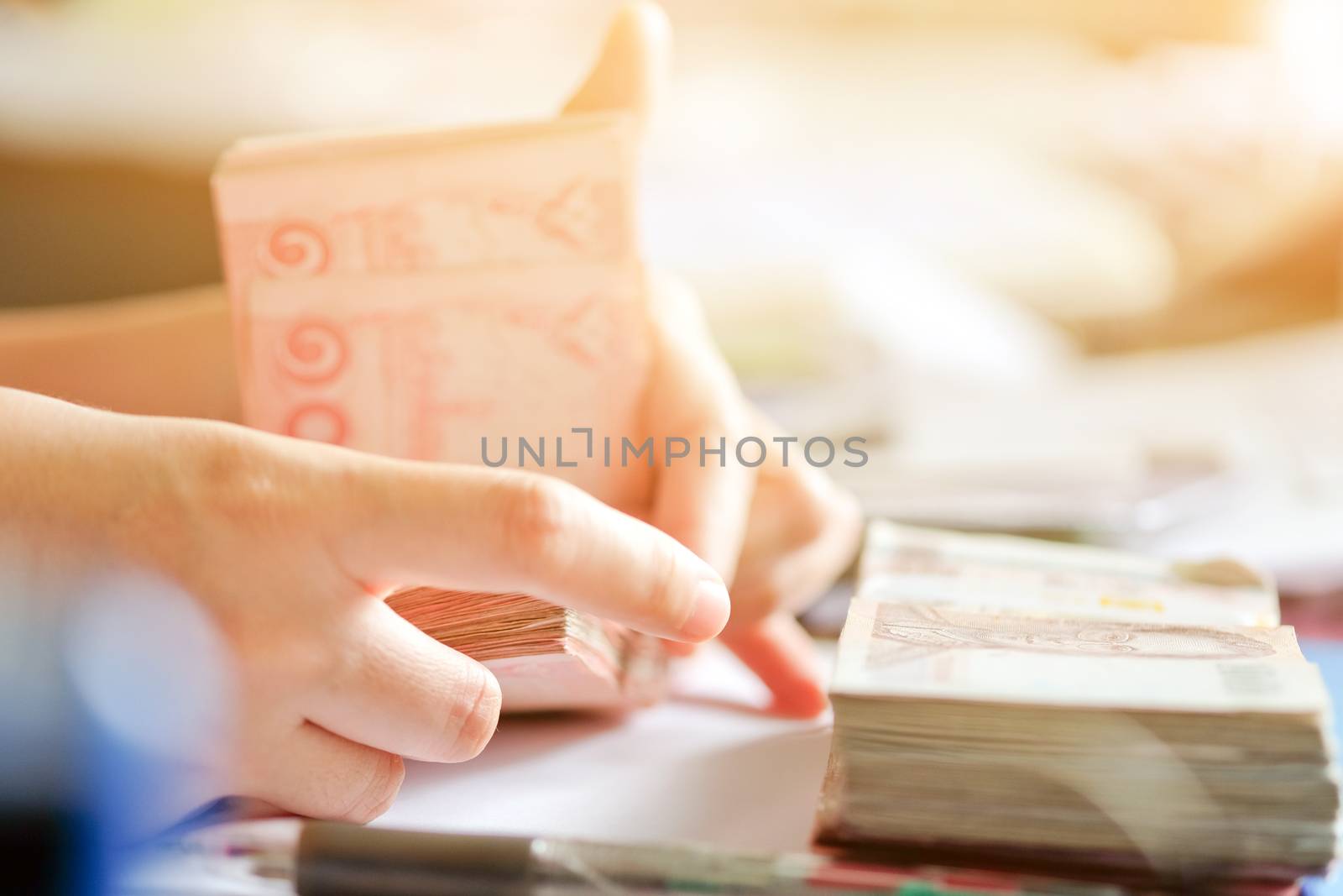 close up image of female hand count the money, business accounting background