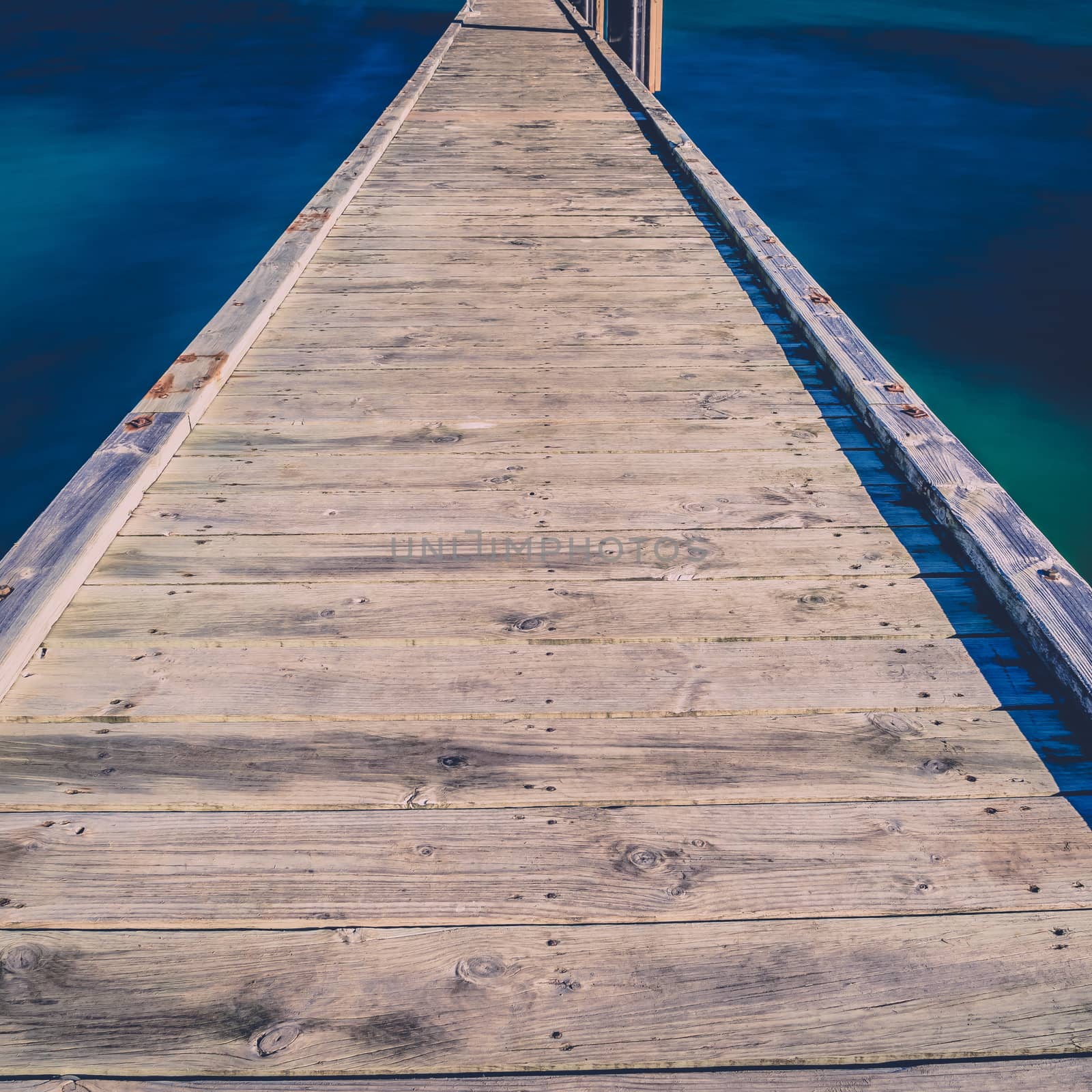 Freycinet Pier by Coles Bay in Tasmania by artistrobd