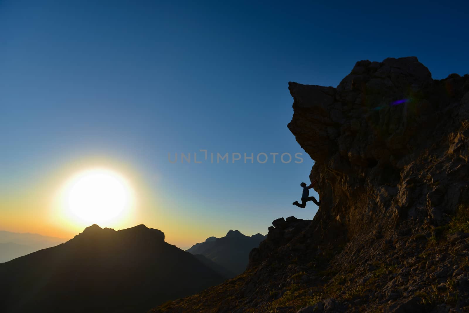 rock climbing in the high mountains by crazymedia007