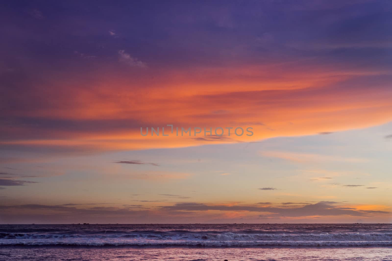 Sunset on the beach with beautiful reflecion and sky