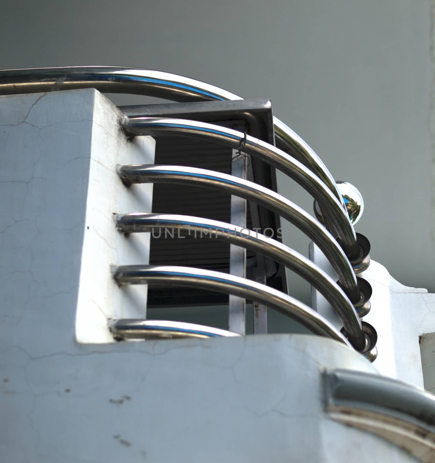 COLOR PHOTO OF CURVING STAINLESS STEEL HANDRAIL