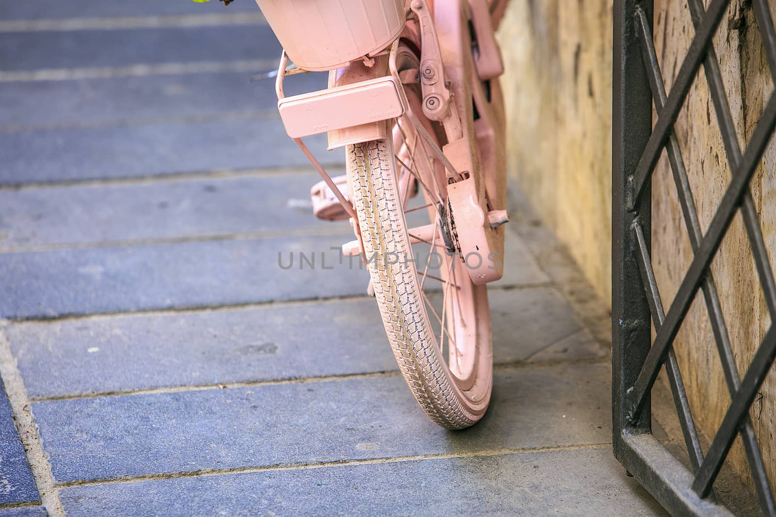 vintage Pink bicycle with basket of flowers