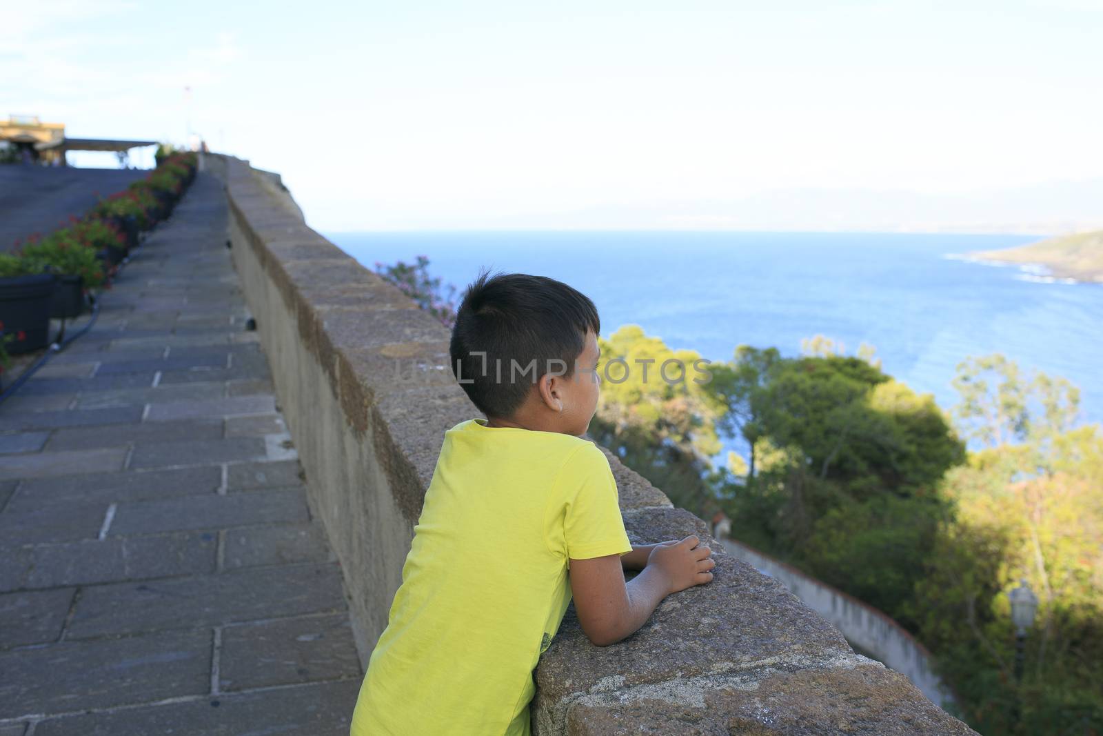 Boy seeing the blue sea