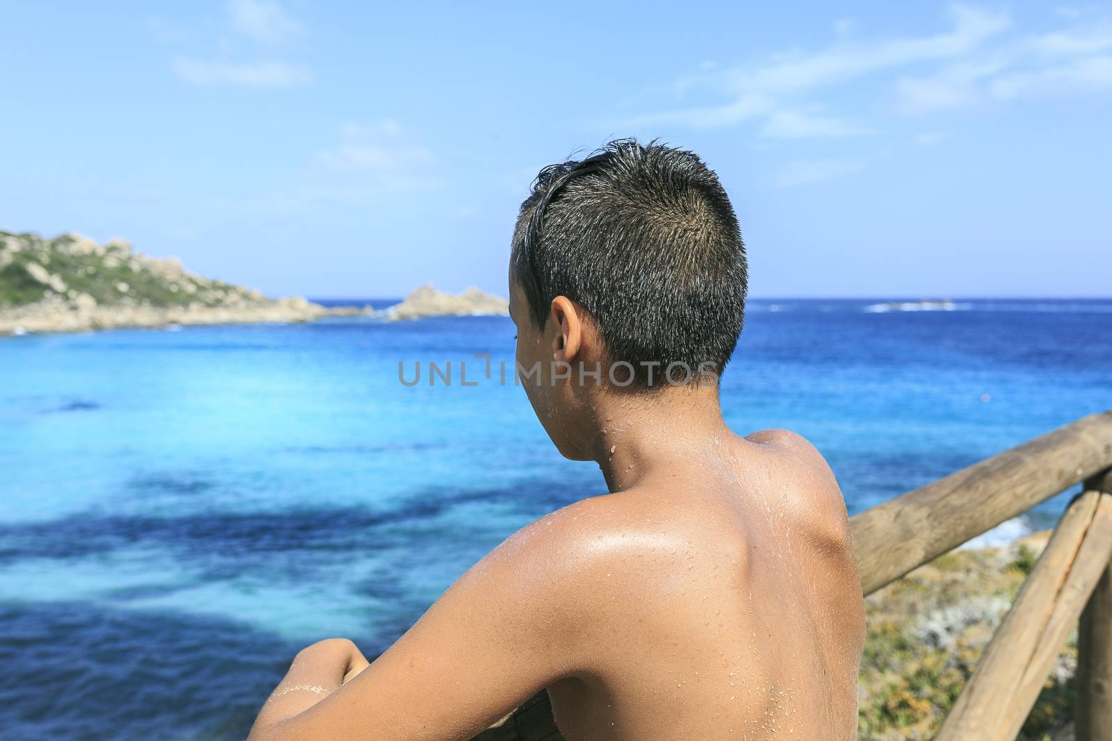 Boy seeing the blue sea