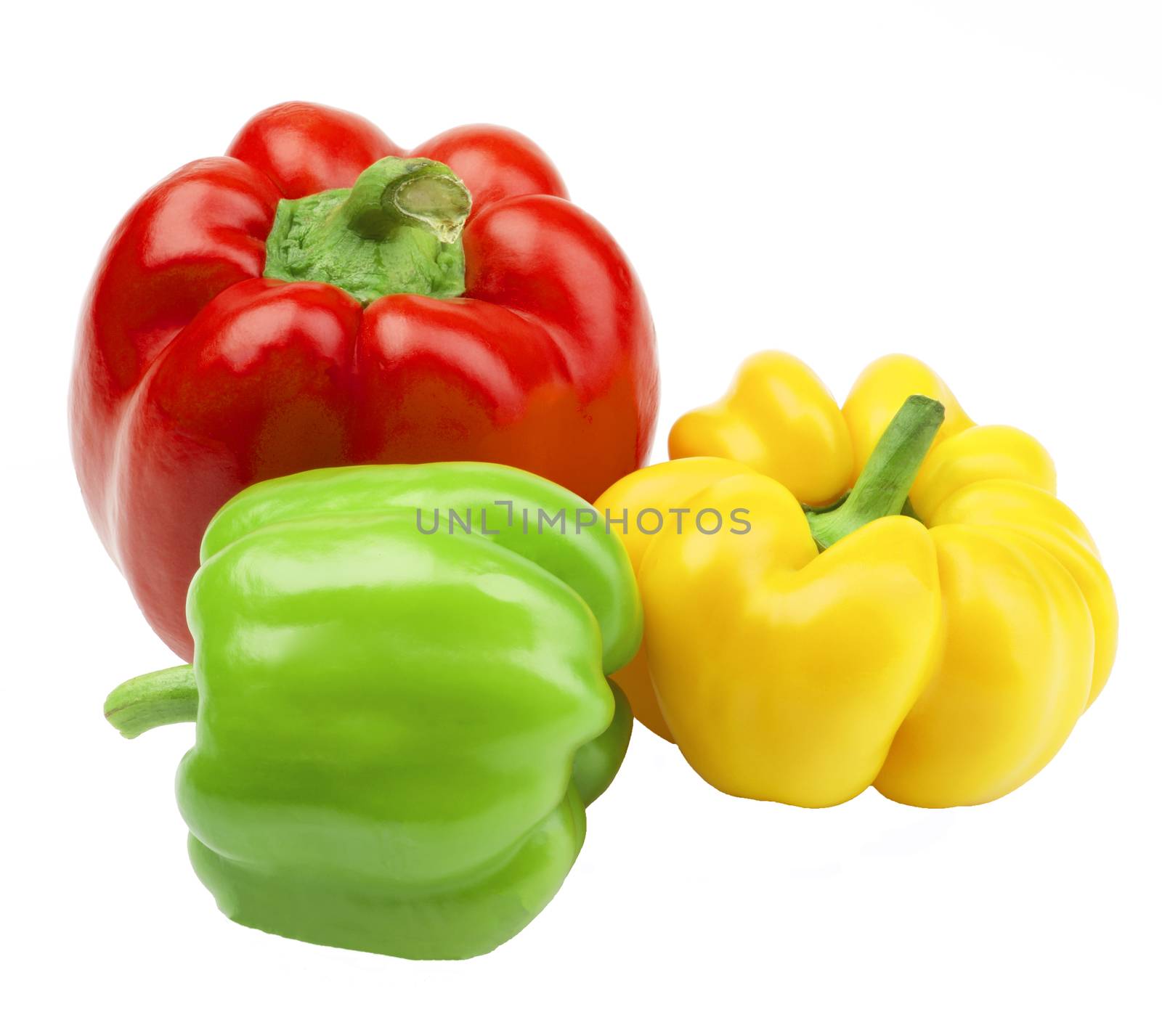 Three Perfect Ripe Shiny Red Bell Peppers isolated on White background