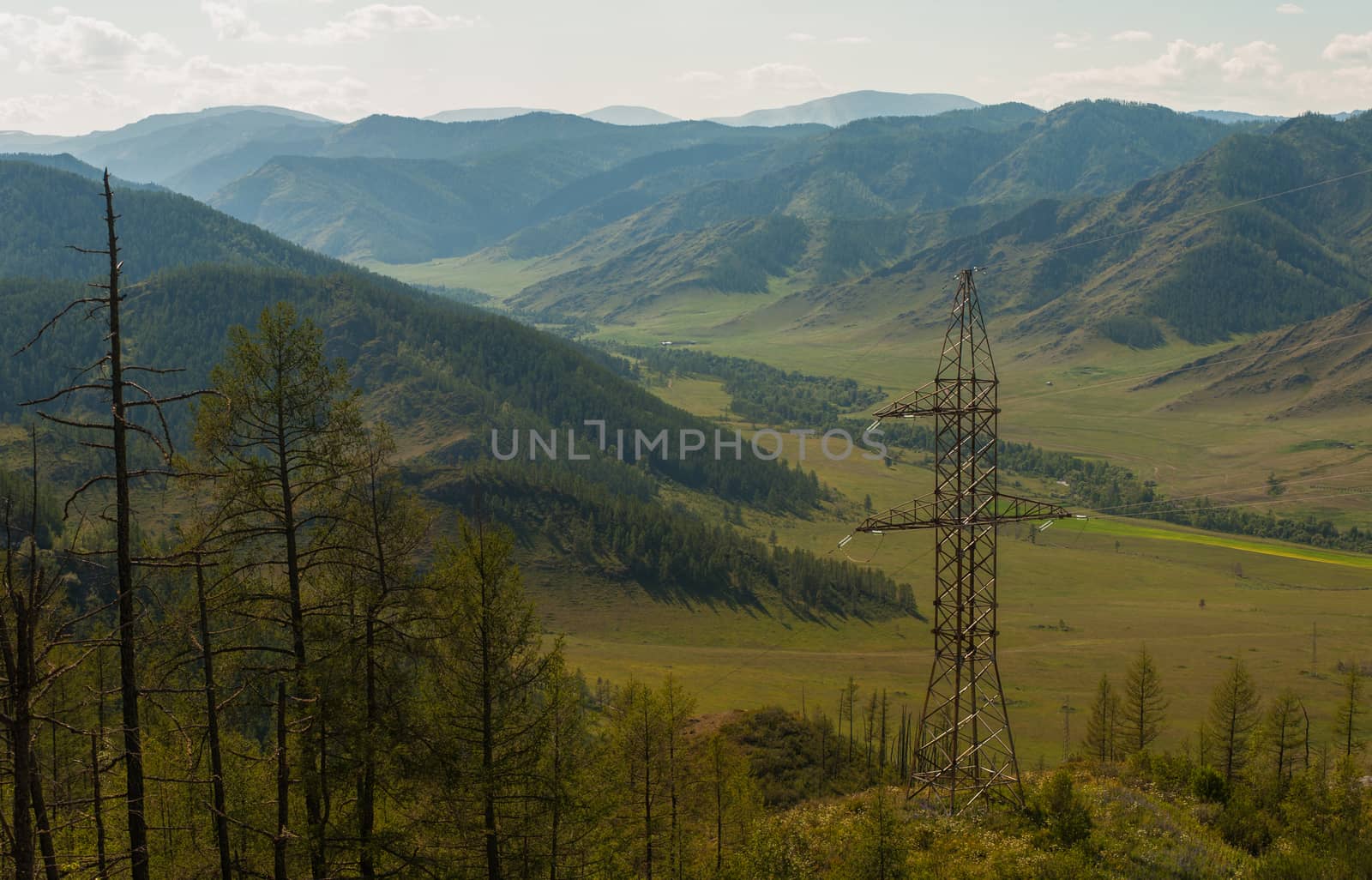 Electric pillar in the mountain, sunny day