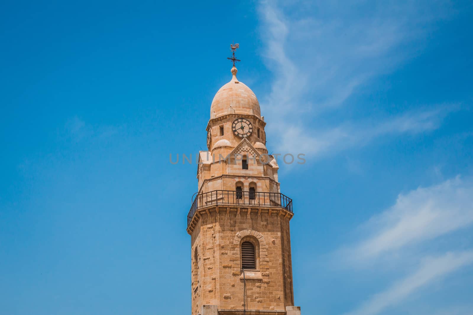 The clock tower of the Abbey of the Dormition building at mount zion in Jerusalem.
