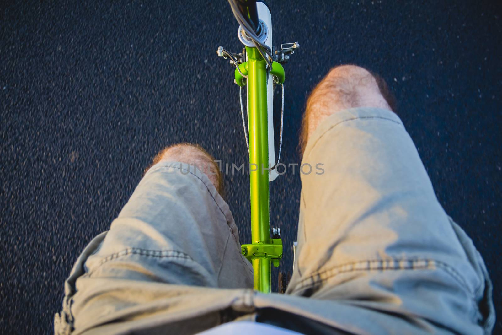 Riding a bike on the road. Original point of view (POV).