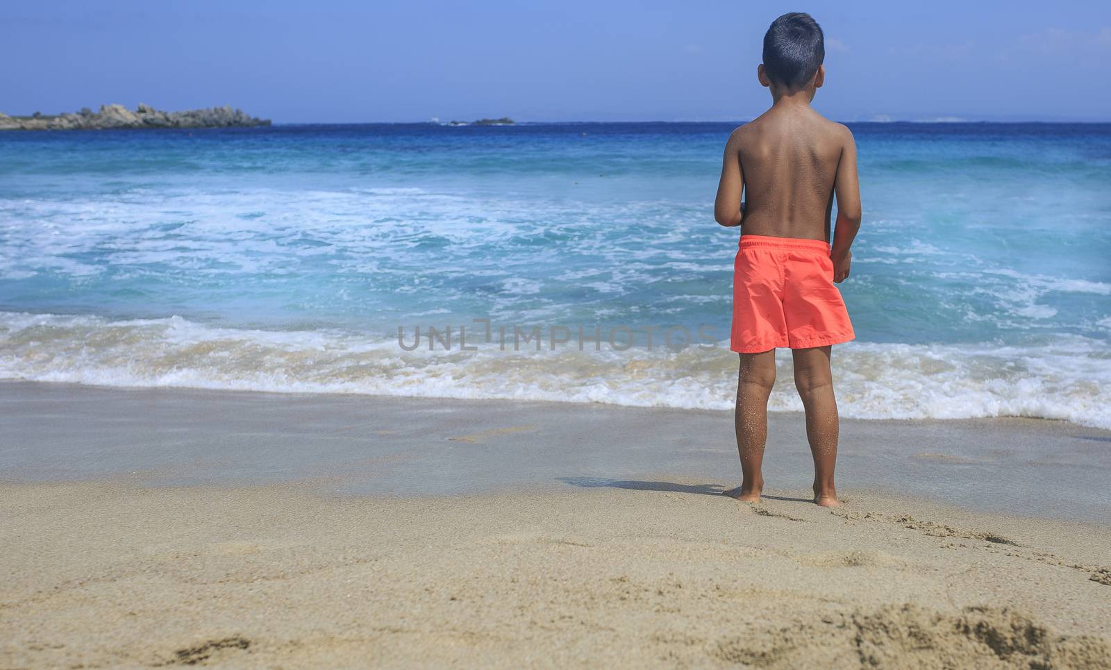 Young boy seeing the sea
