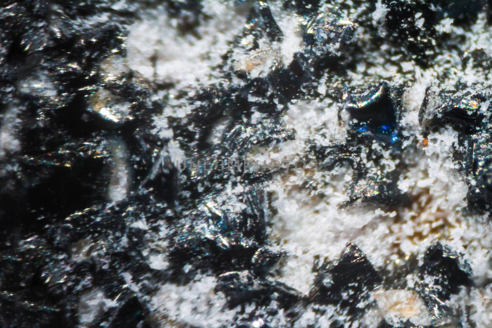 Black nail file under the microscope. Closeup macro photography.