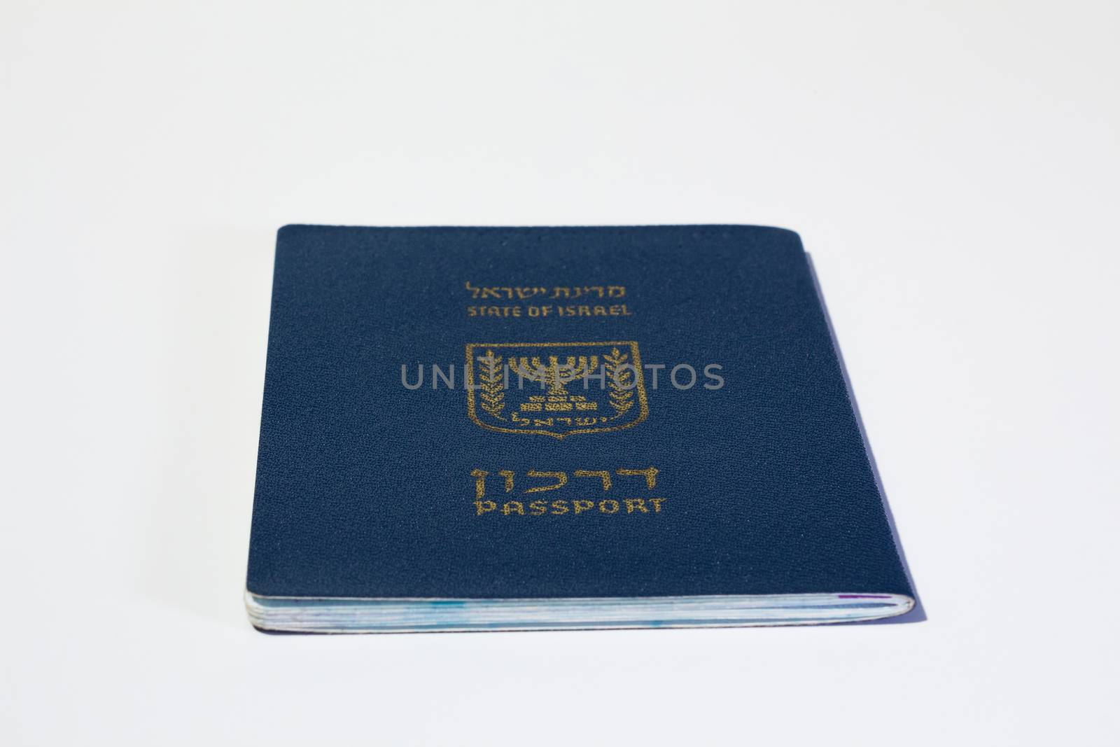 Israeli passport on white background.