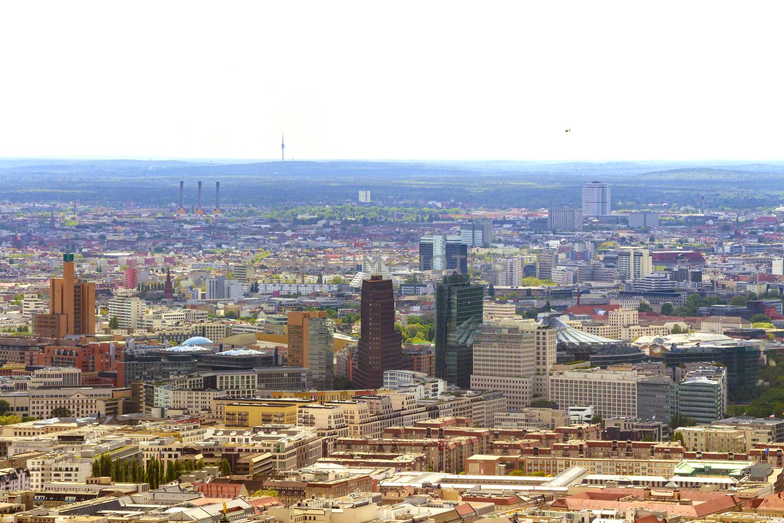 Aerial view of Berlin skyline with colorful buildings.
