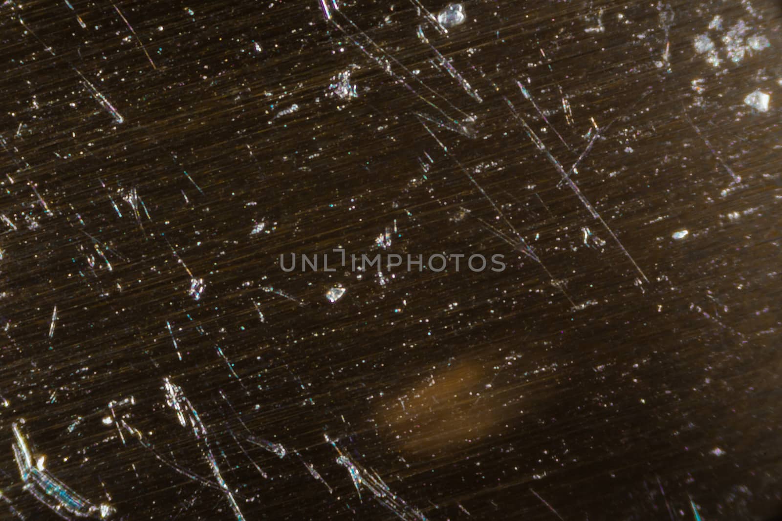 Extreme closeup of a knife under the microscope.