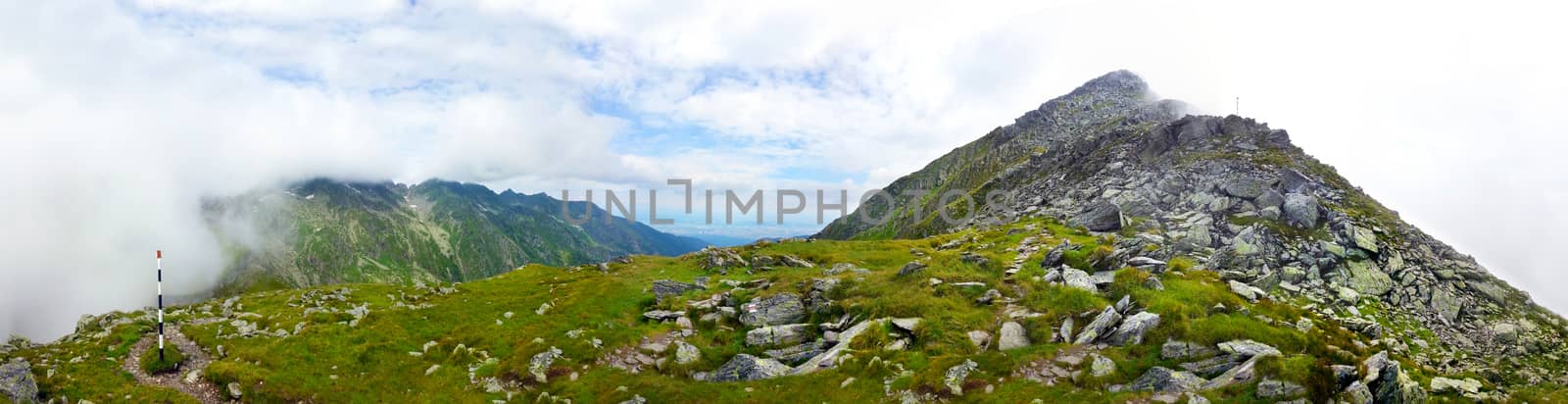 Panoramic view of Fagaras Mountain on summer, part of the Carpathian Range, Romania - path to Negoiu peak