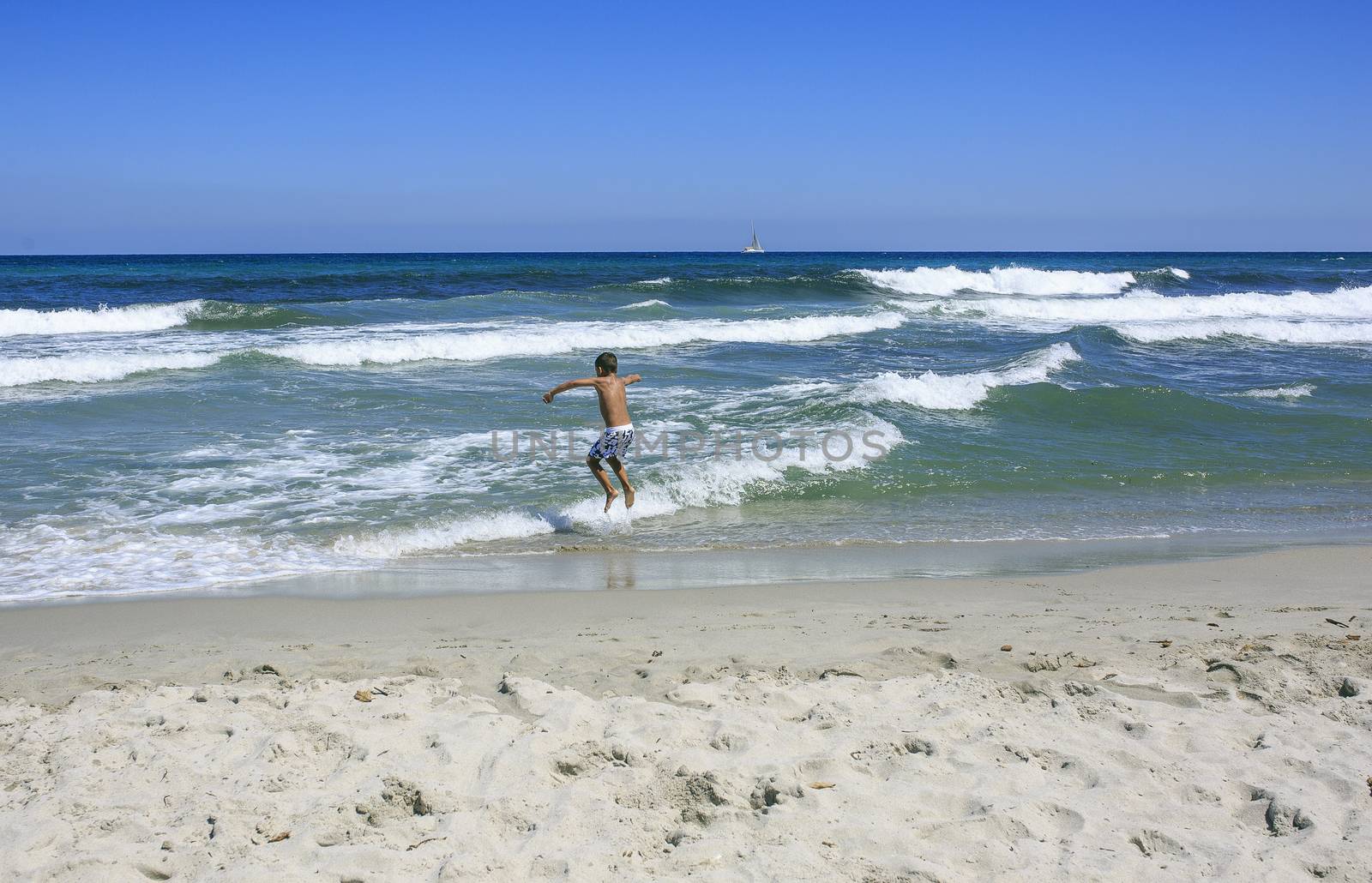 Boys playing on the beach