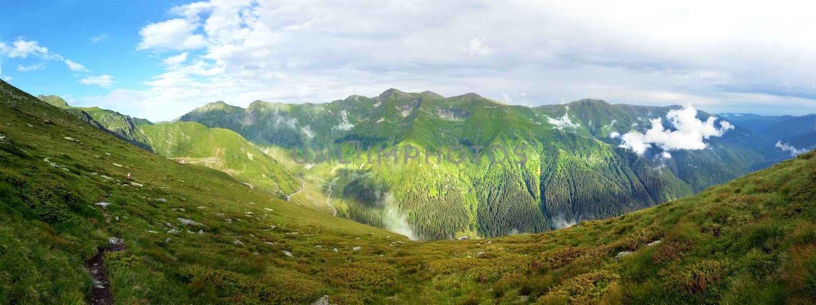 Panoramic view of Fagaras Mountain on summer, part of the Carpathian Range from Romania
