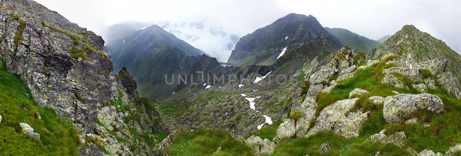 Panoramic view of Fagaras Mountain on summer, part of the Carpathian Range, Romania - path to Negoiu peak