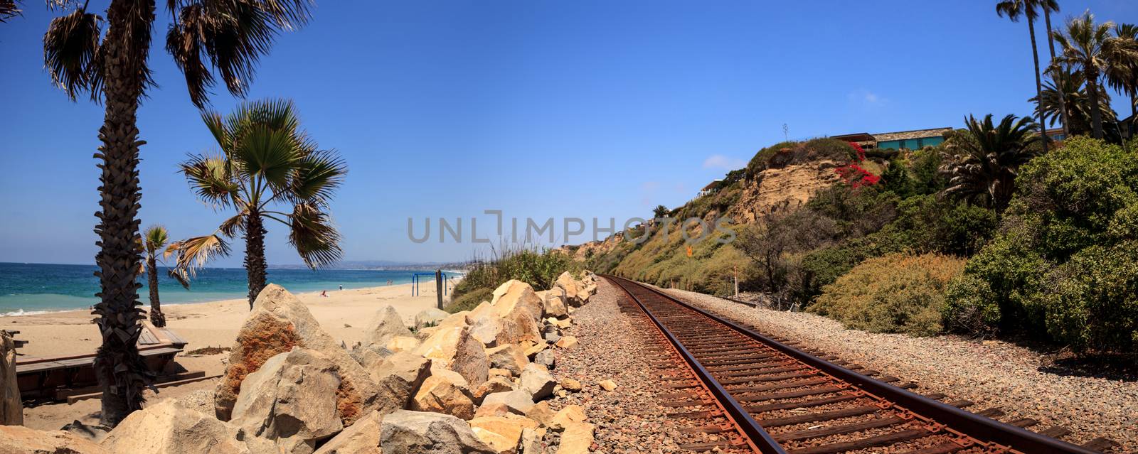 Train tracks run through San Clemente State Beach  by steffstarr