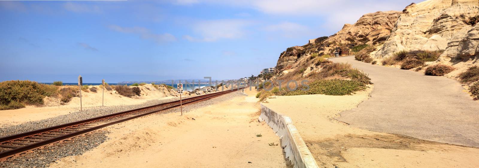 Train tracks run through San Clemente State Beach by steffstarr