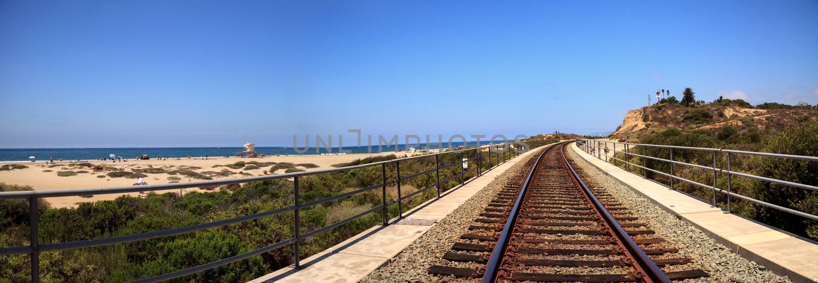 Train tracks run through San Clemente State Beach by steffstarr
