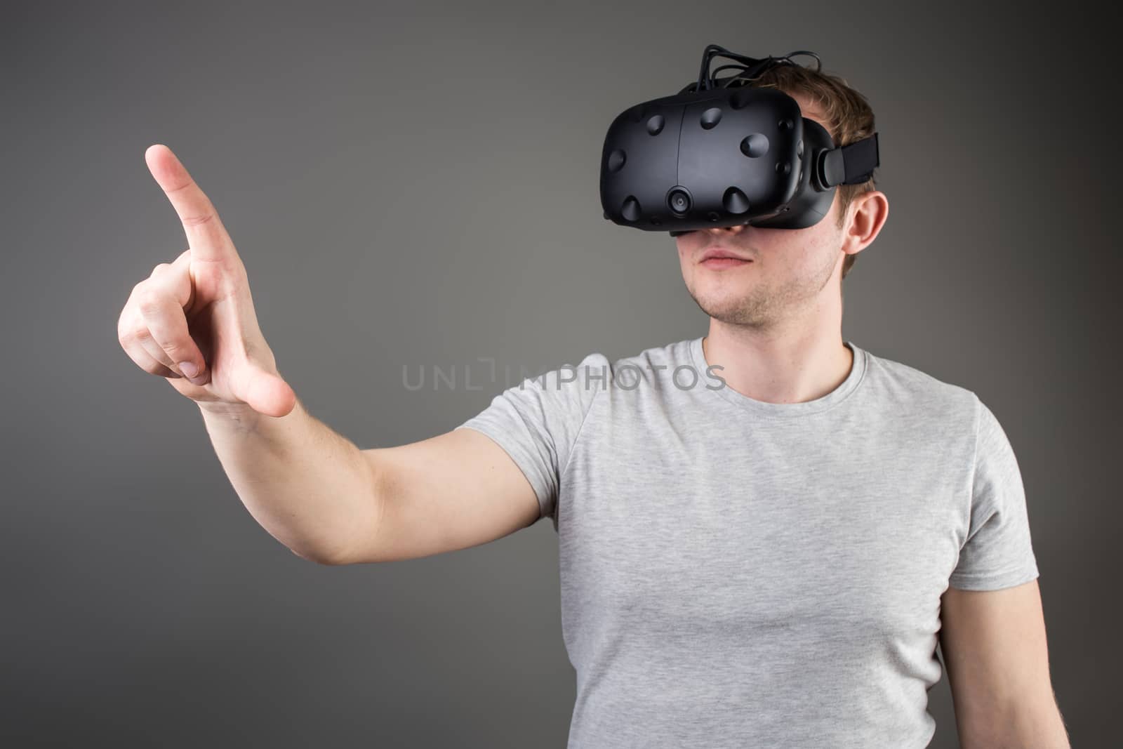 Male business executive using virtual reality headset