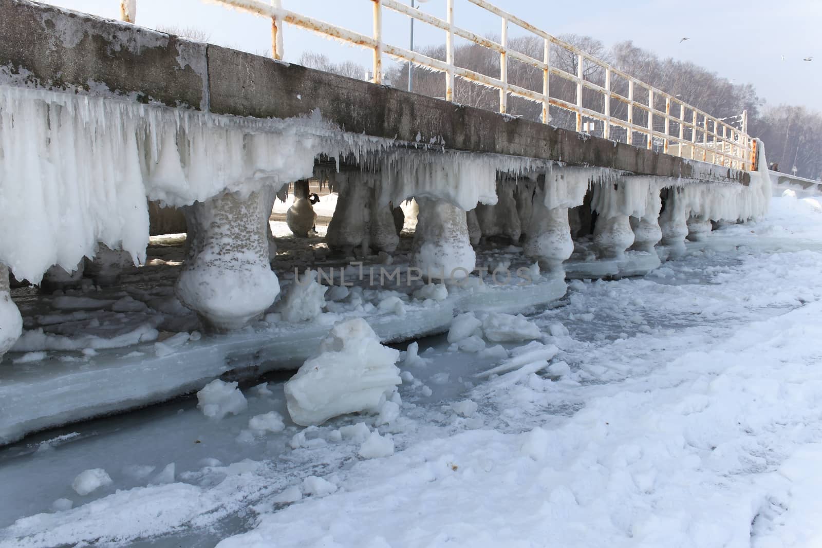 Frozen pier on the Baltic Sea by Kasia_Lawrynowicz