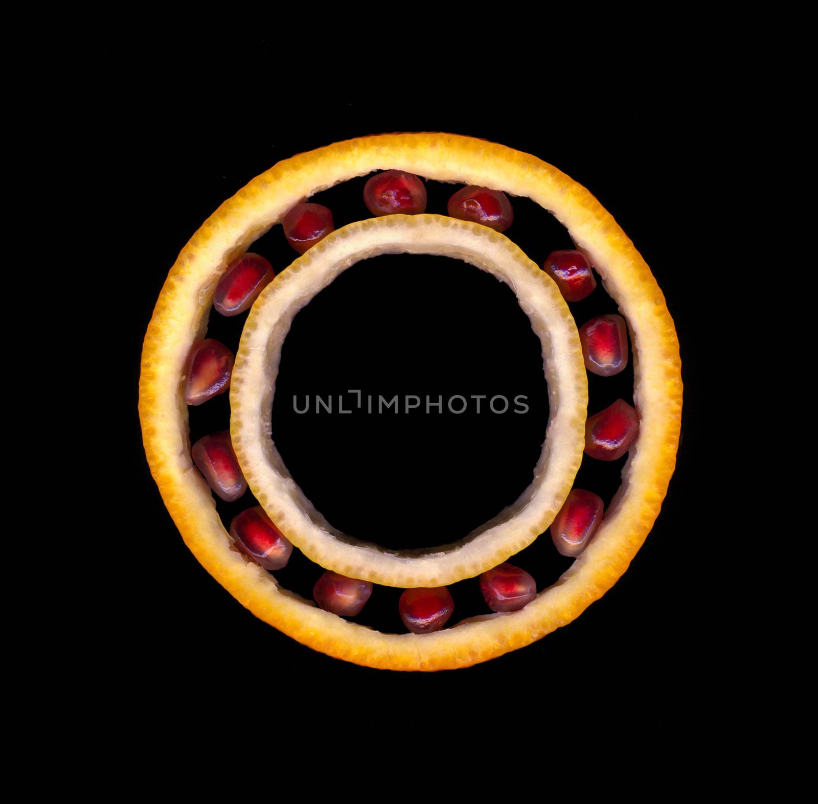 Industrial ball bearing style made of fruits parts: orange, lime, pomegranate seeds. Double sense Natural Bearings. Unusual funny fruity food bearing abstract fractal background. Incredible food humor by mikhail_leonov