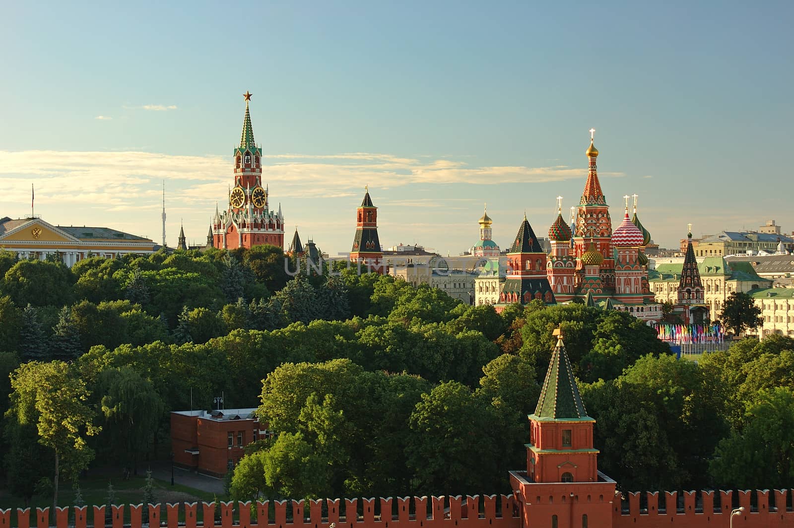 Evening view on Moscow Red Square Kremlin towers red square wall stars and Clock Kuranti Saint Basil Cathedral church. Panorama from bell tower. Moscow holidays vacation famous sightseeing tours by mikhail_leonov