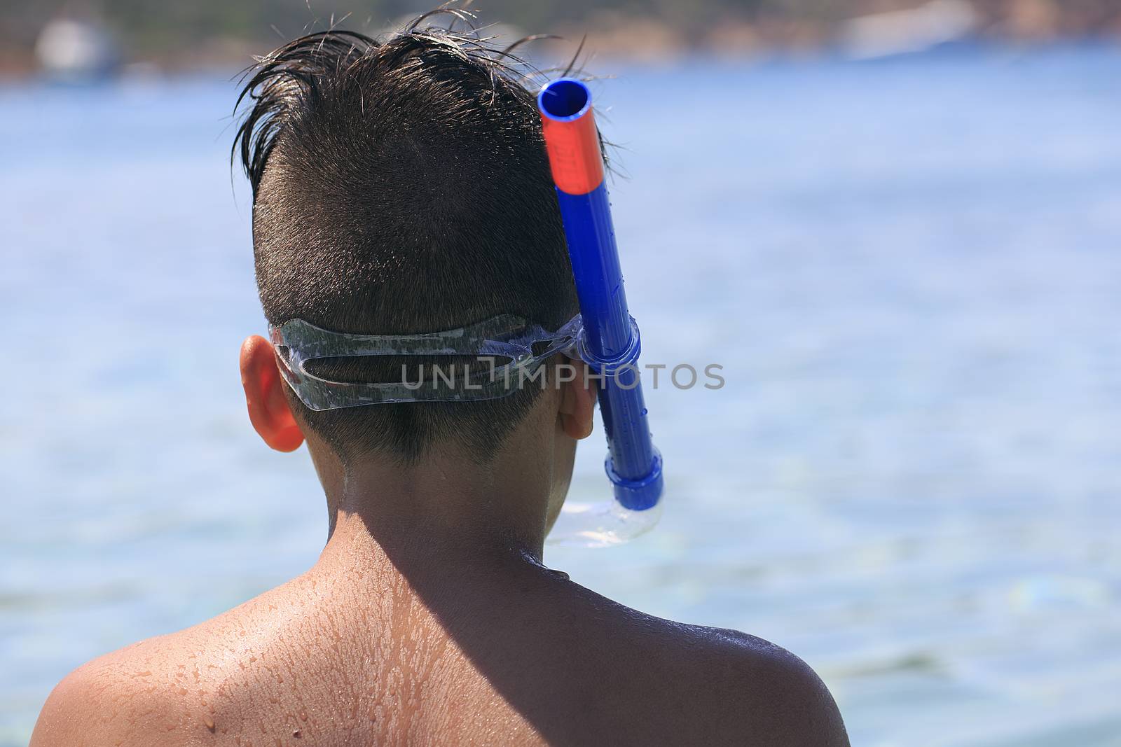 Boy with snorkeling mask