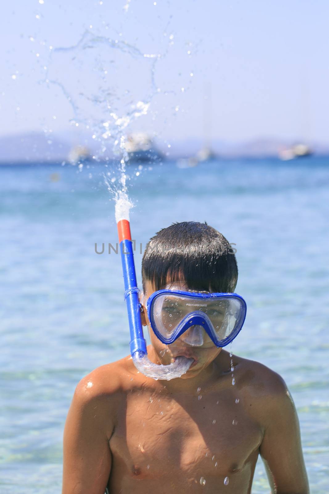 Boy with snorkeling mask