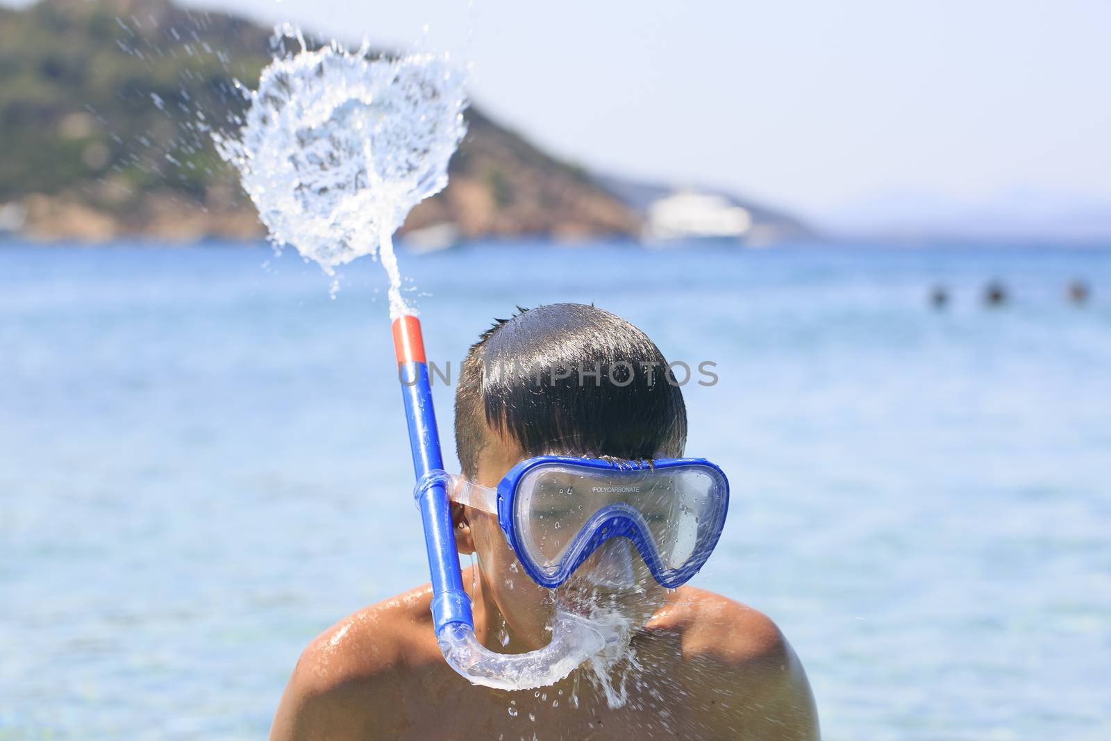 Boy with snorkeling mask