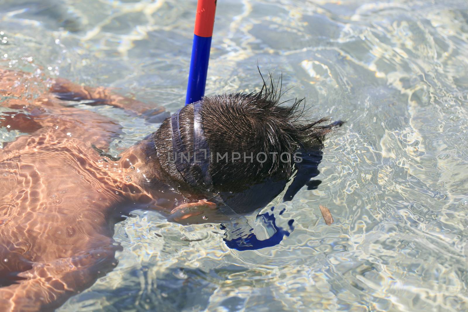 Boy with snorkeling mask by nachrc2001