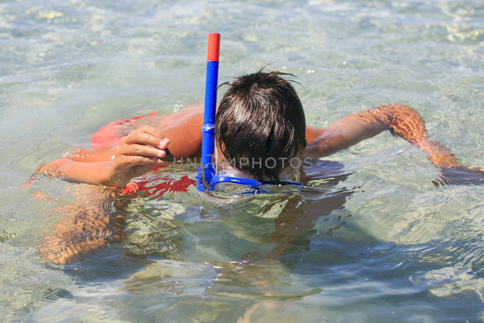 Boy with snorkeling mask