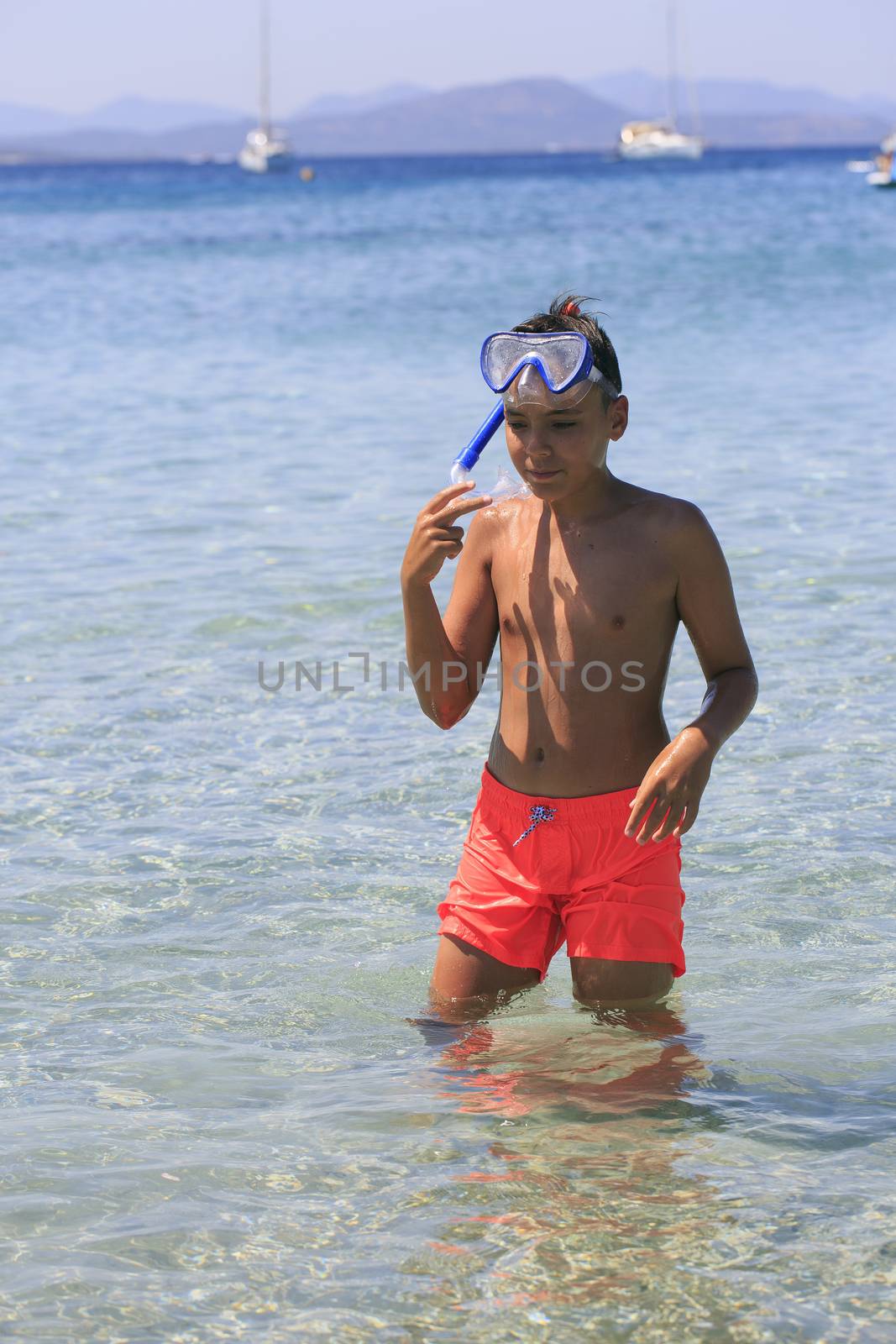 Boy with snorkeling mask